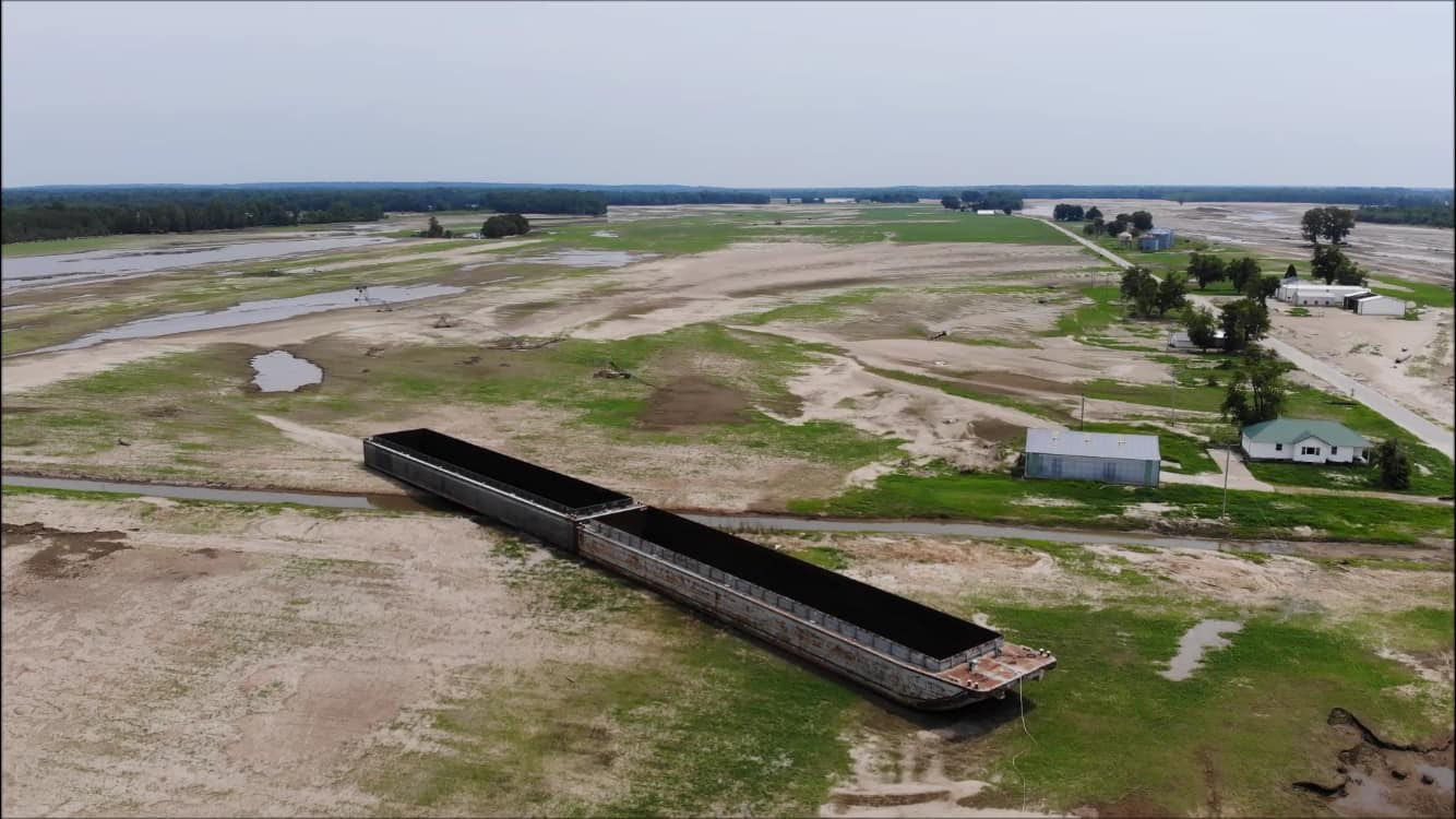 Two barges remain on farmland in Alexander County, Illinois after being sucked through a breach in the Len Small Levee. August, 2019